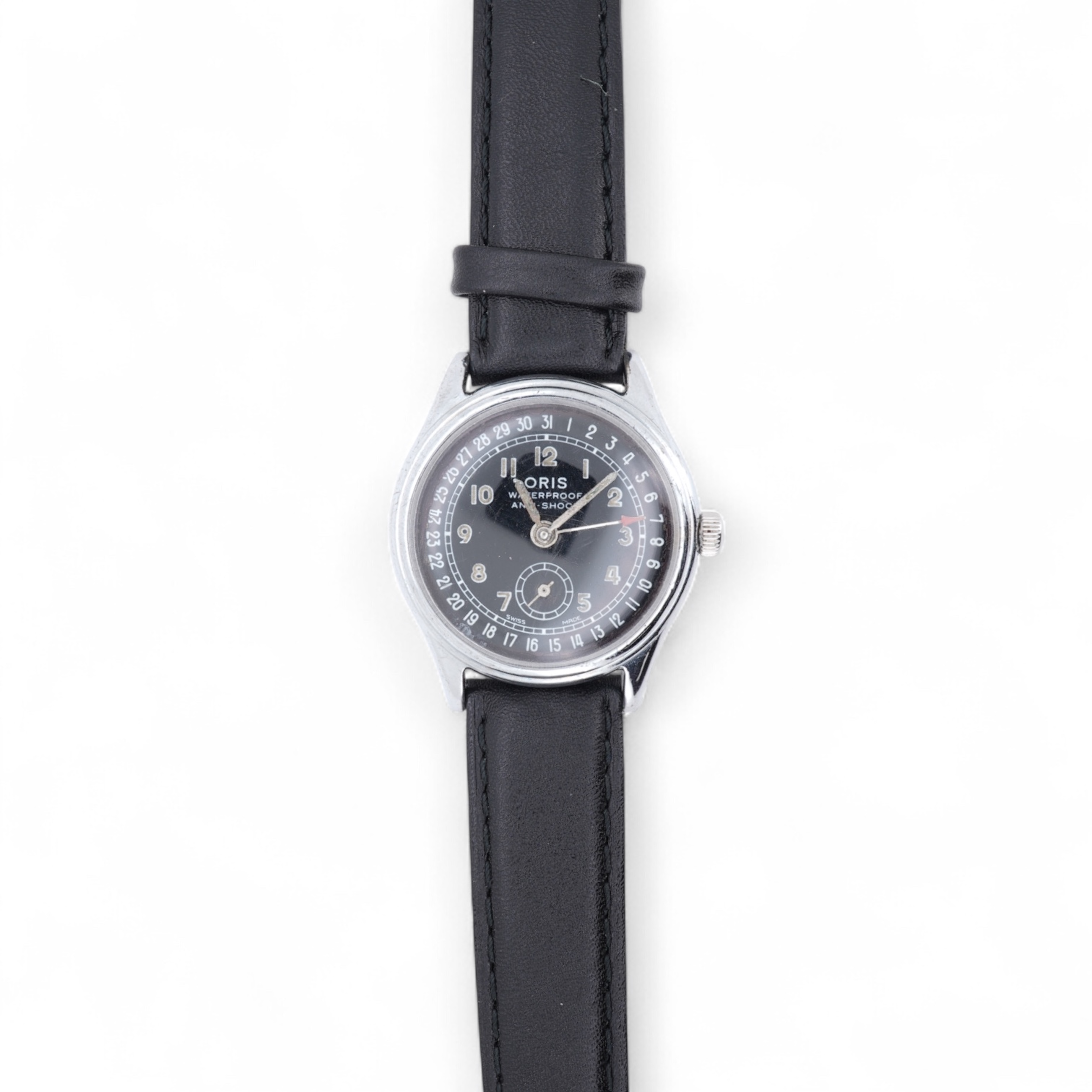 A gentleman's stainless steel backed Oris manual wind calendar wrist watch, with black Arabic dial, subsidiary seconds and date indicator hand, case diameter 32mm, on an associated leather strap, no box or papers.